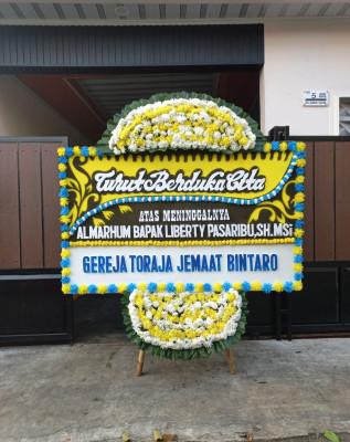 Papan Bunga Duka di Pino